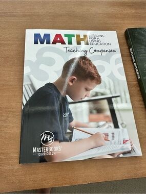 MasterBooks Math Teaching Companion & Revealing Arithmetic book bundle